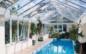 Glass extension housing indoor pool