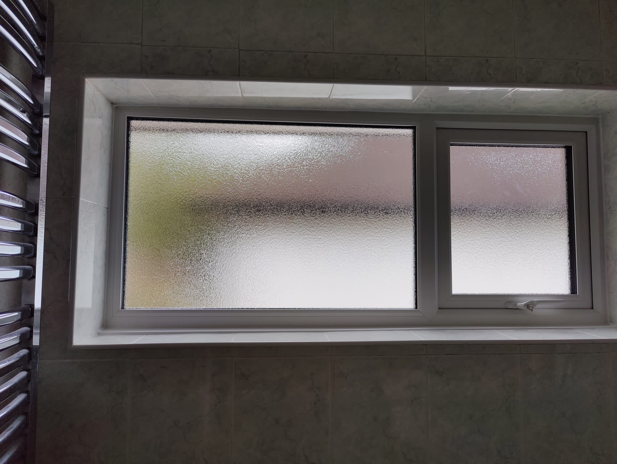 The Chislehurst Installation In System 10 Chamfered Bevelled UPVC With Lead, Openers And Fixed Panes