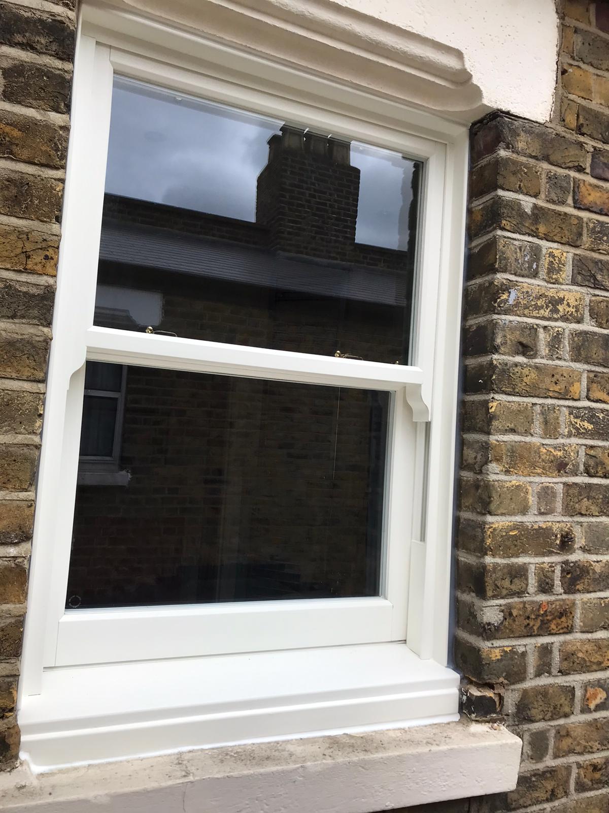 White Woodgrain UPVC Vertical Sliding Sash Window