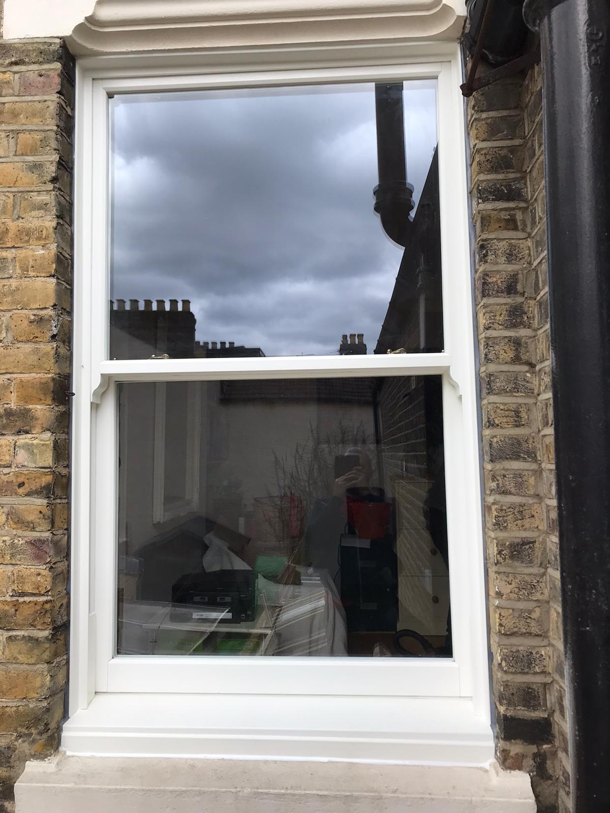 White Woodgrain UPVC Vertical Sliding Sash Window