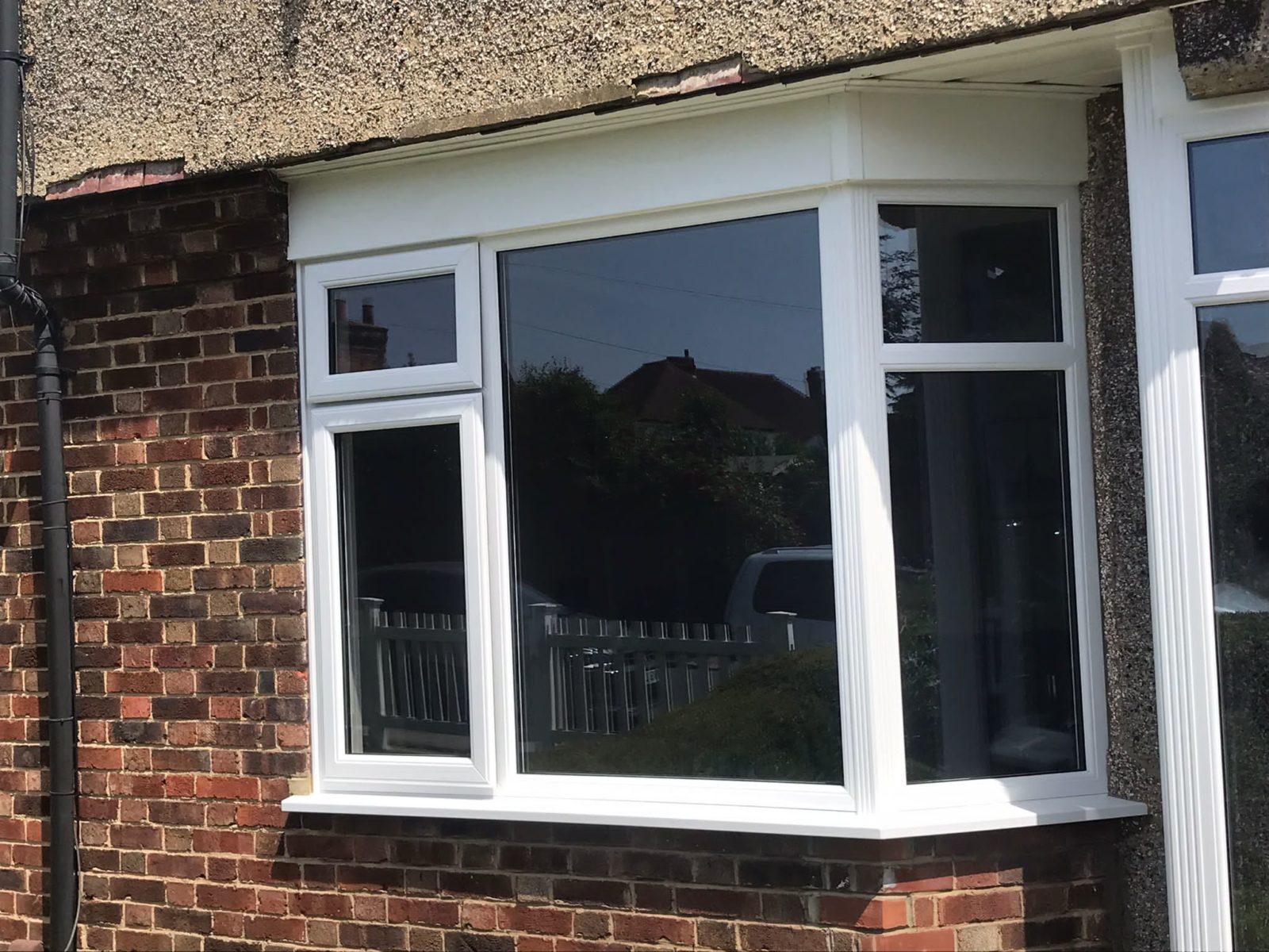 White UPVC Windows Showing Openers And Fixed Panes